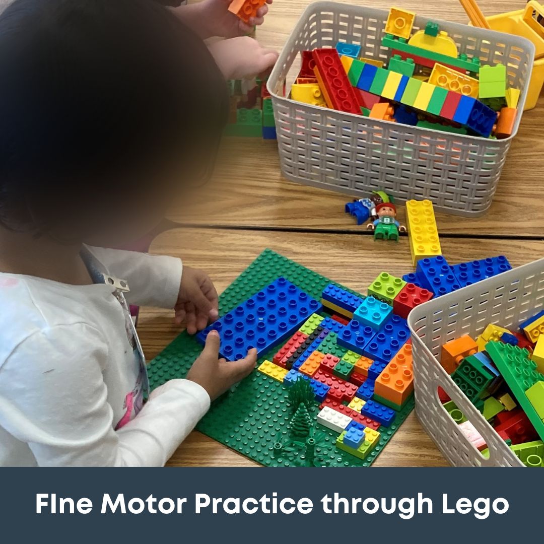 Children learning through play using lego
