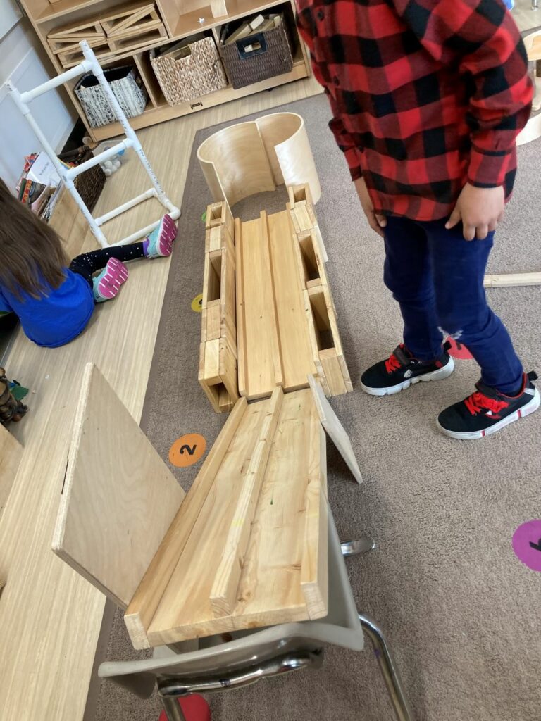 Kindergarten builders making ramps