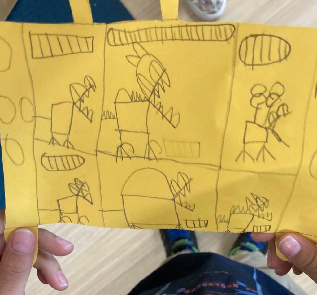 Drawing a story in the last full week in kindergarten